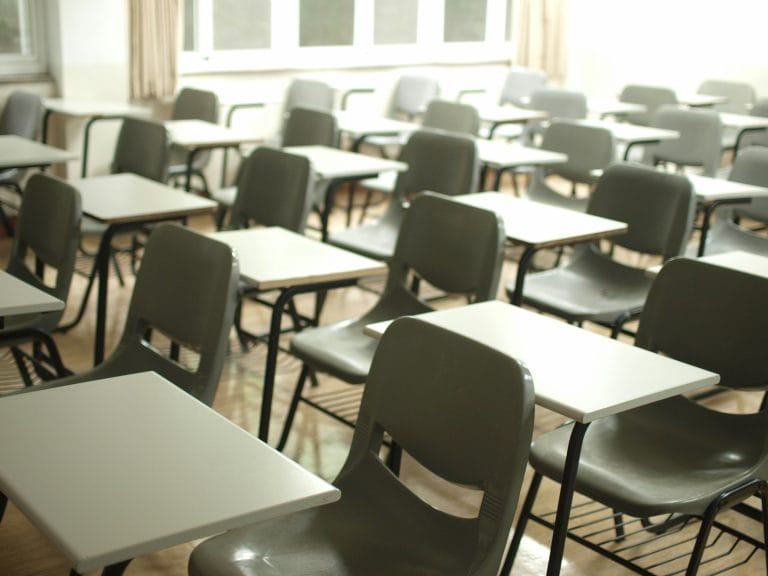 A photo of desks in a classroom