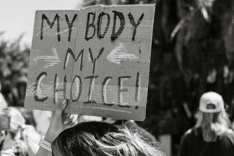 A photo of a pro choice protest. The protest sign shown says my body my choice