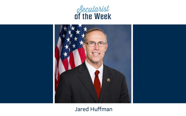 A photo of Jared Huffman with the title secularist of the week